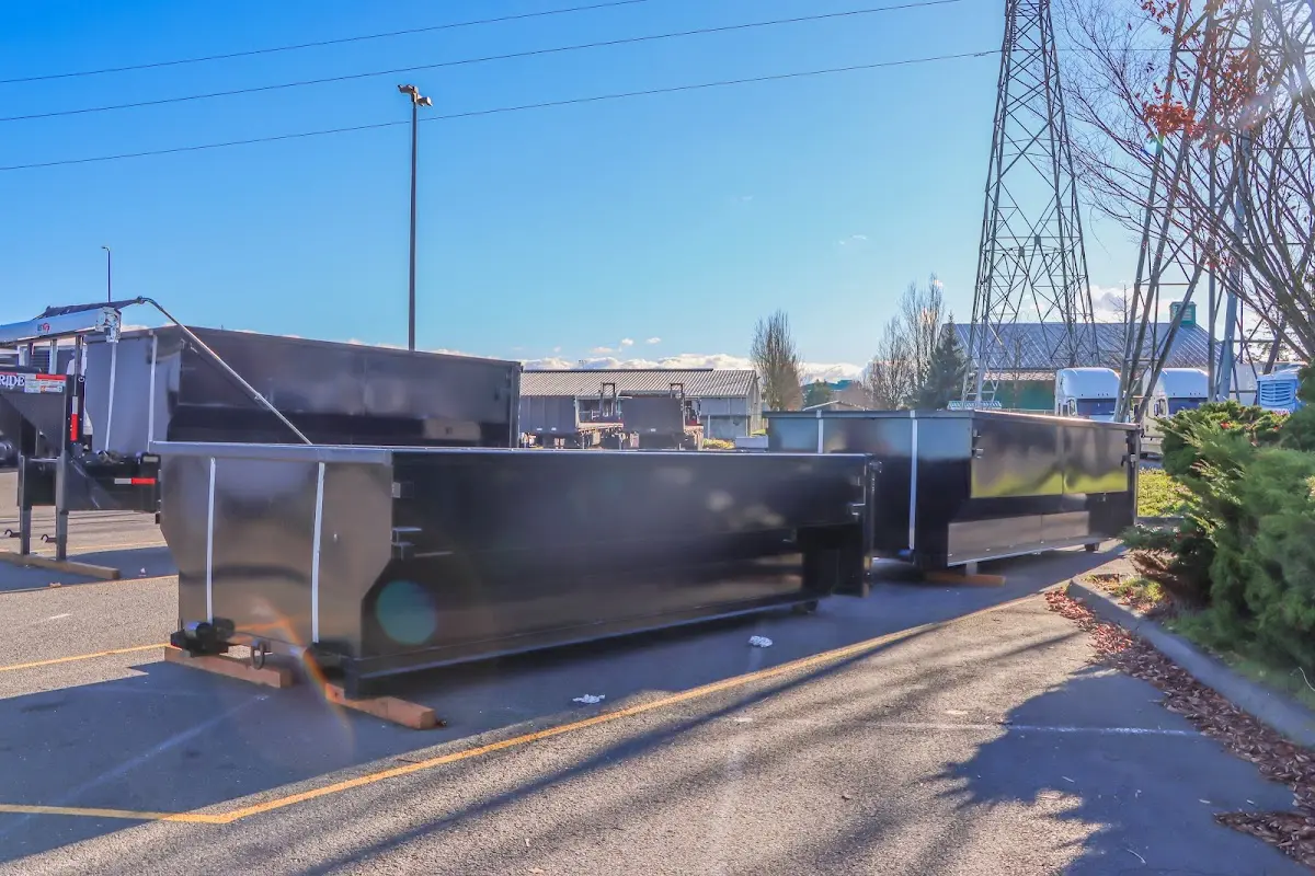 Roll-off dumpster ready for waste disposal at job site for Demolition Dumpster Rental in Jacksonville
